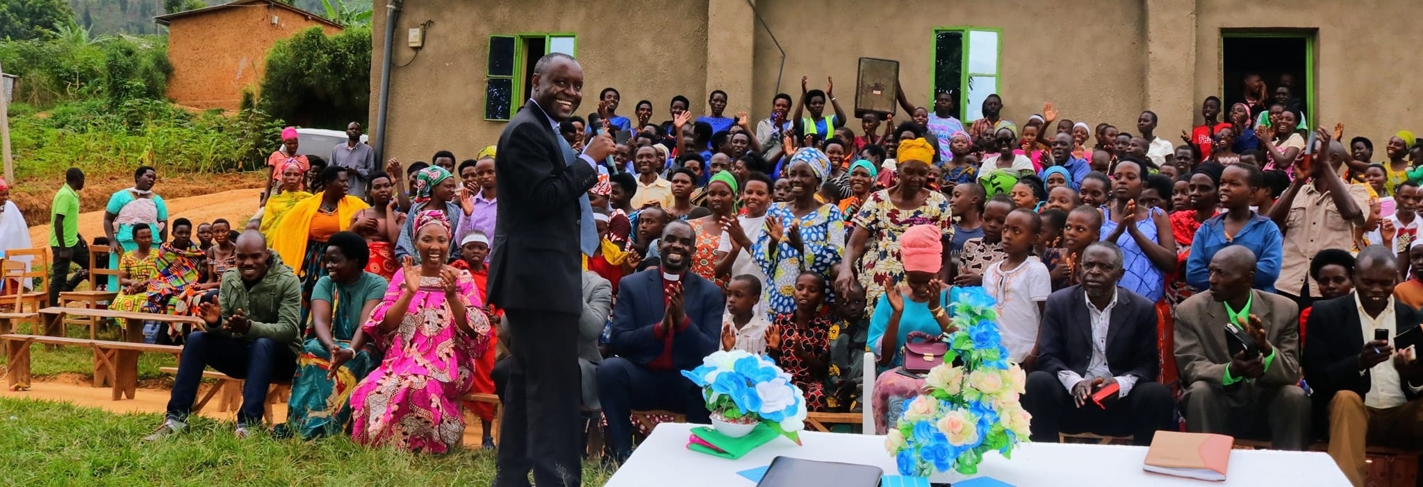 Large outdoor gathering in rural Africa