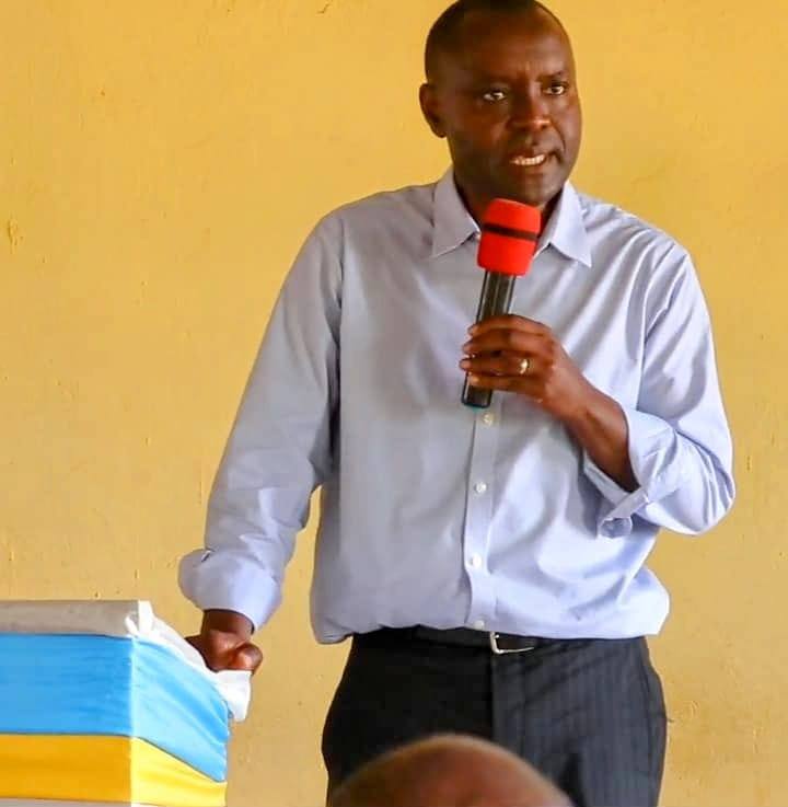 Pastor Fidele preaching